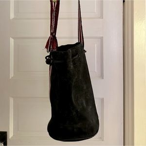 Custom black suede bucket purse with handwoven strap, from Guatemala.